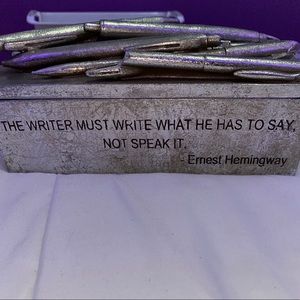 Ernest Hemingway quite metal pencil/ pen holder